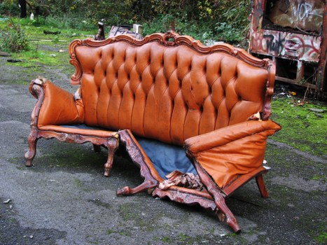 Photo of a skip outside a property representing skip hire services