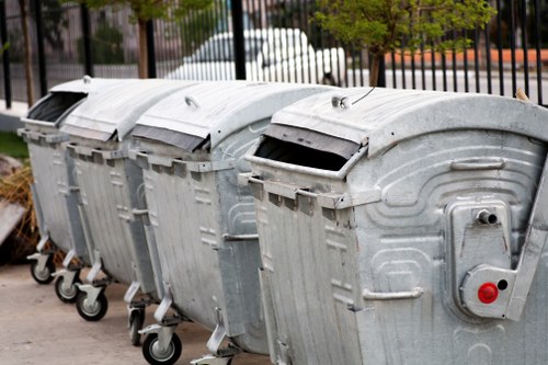Professional waste removal team at a Regents Park construction site
