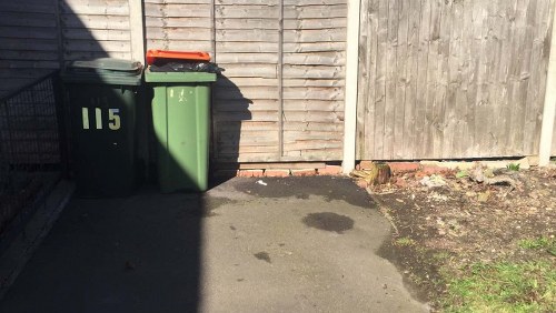 Professional team managing skip placement on a construction site